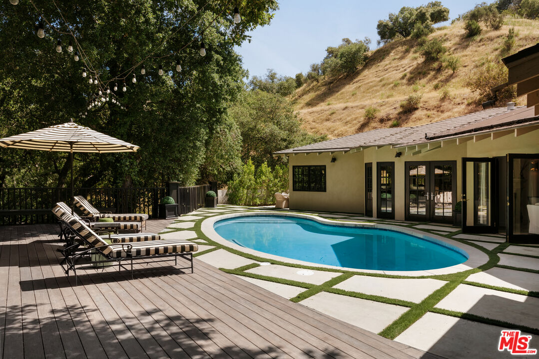 Pool and sunning deck, 16822 Escalon Dr